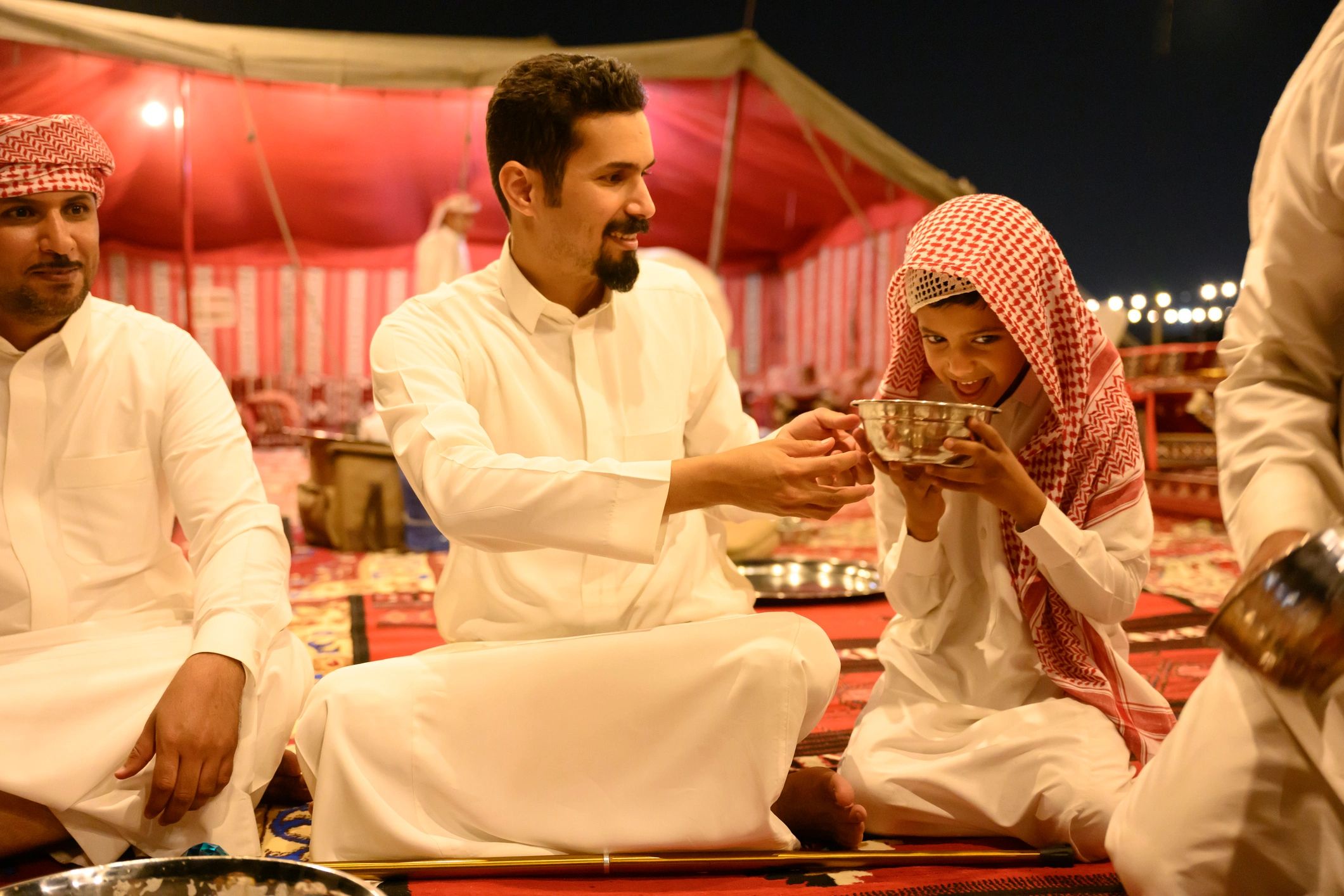 Traditional hospitality gathering in Saudi tent setting